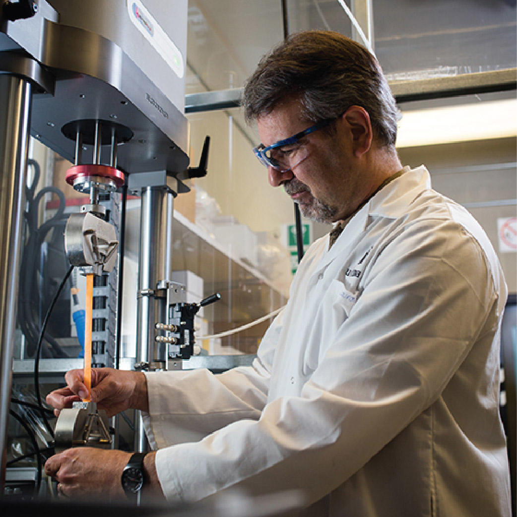 Researcher in a lab on campus